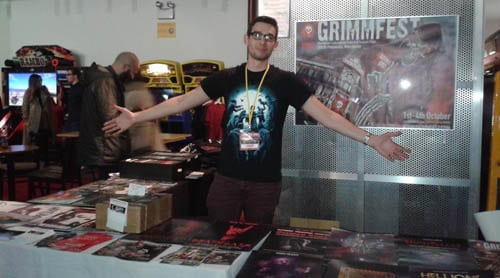 Courtney selling posters at the Grimmfest Festvial Hub